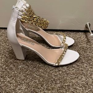 White and gold heels